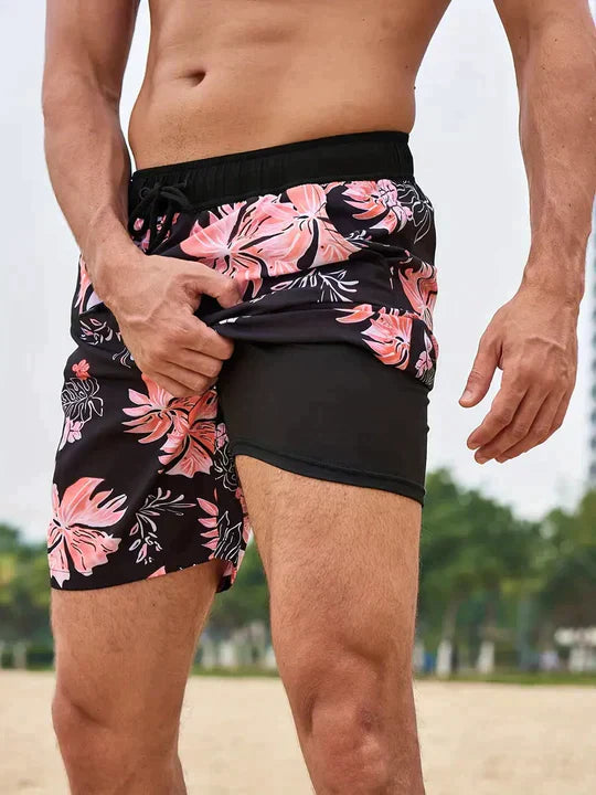 Herren Badeshorts mit rosa Blumenmuster, schwarz, Strandmode, schnell trocknend.