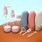 Reise-Flaschen-Set aus Silikon und Kunststoff, bunt, nachfüllbar, ideal für Kosmetikprodukte.