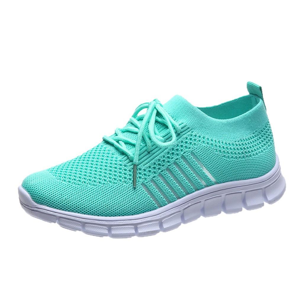 Mintgrüner Sportschuh mit atmungsaktivem Strick-Obermaterial und flexibler, weißer Sohle. Ideal für Laufen, Fitness und Freizeit.