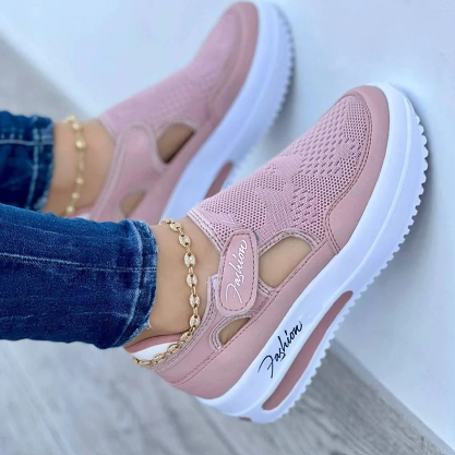 Damen Sneaker in Rosa mit Keilabsatz, atmungsaktivem Mesh und modischem Design. Perfekt für Freizeit und Sport. Bequeme, stilvolle Schuhe.