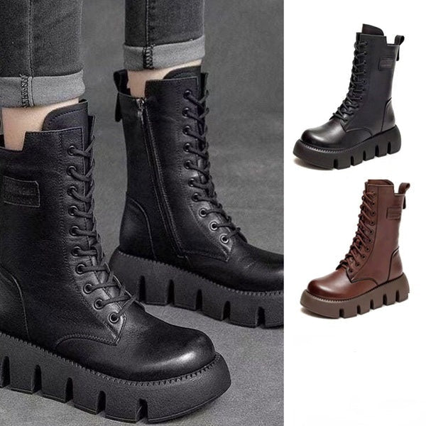 Schwarze Lederstiefel mit dicker Sohle, Schnürung und seitlichem Reißverschluss. Trendige Damenstiefel, ideal für Herbst und Winter.