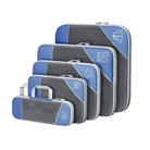 Fünf blaue und schwarze Hartschalenkoffer, stapelbar, Reisegepäck-Set, robust und stilvoll.