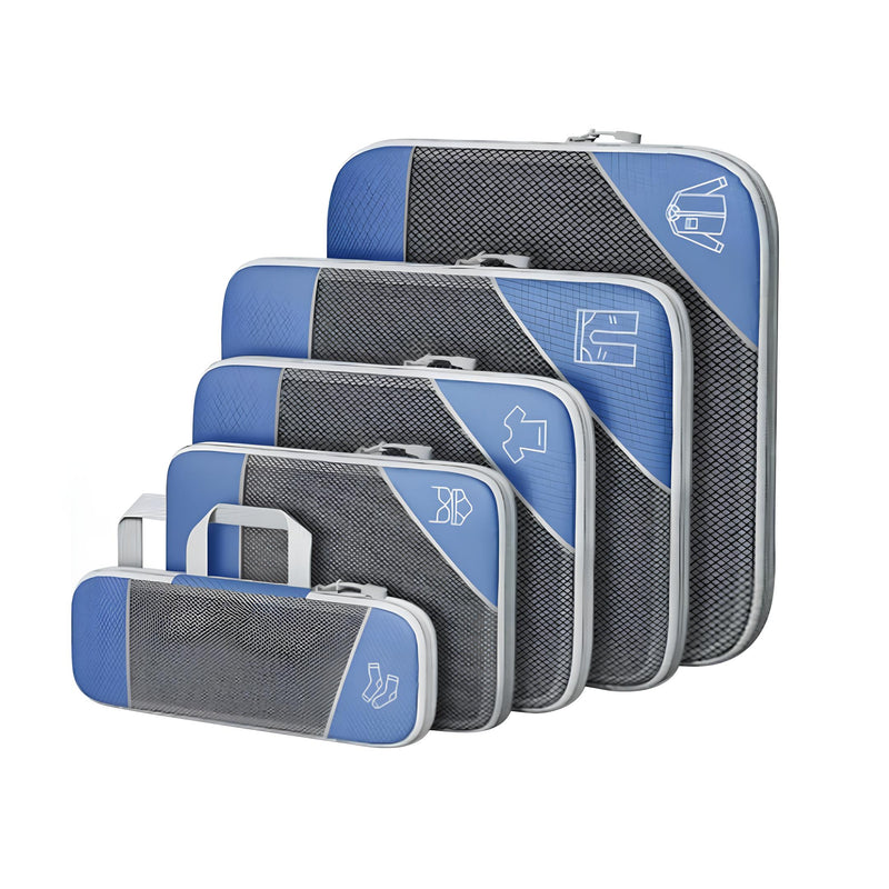 Fünf blaue und schwarze Hartschalenkoffer, stapelbar, Reisegepäck-Set, robust und stilvoll.