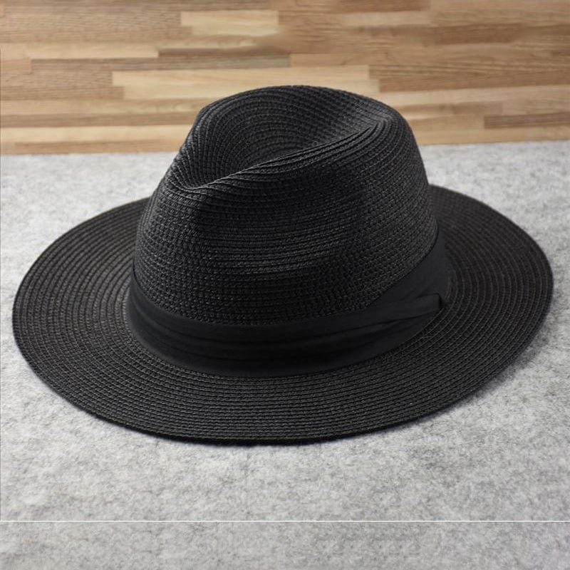 Schwarzer Fedora-Hut aus Stroh, elegantes Design, ideal für Sommermode und Sonnenschutz.