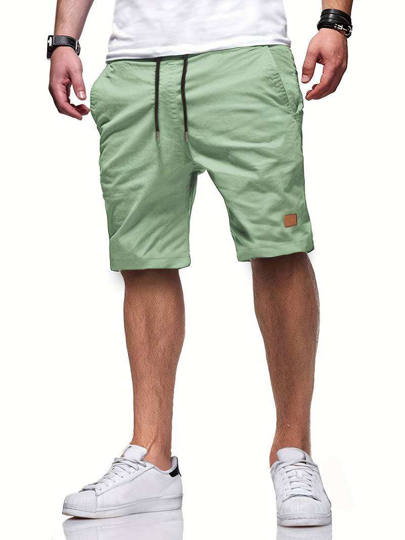 Männer grüne Shorts, lässig, Baumwolle, Kordelzug, Sommermode, Freizeitkleidung.