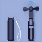 Tragbarer schwarzer Mini-Ventilator mit Katzenohren, USB-aufladbar, kompakt, leise.