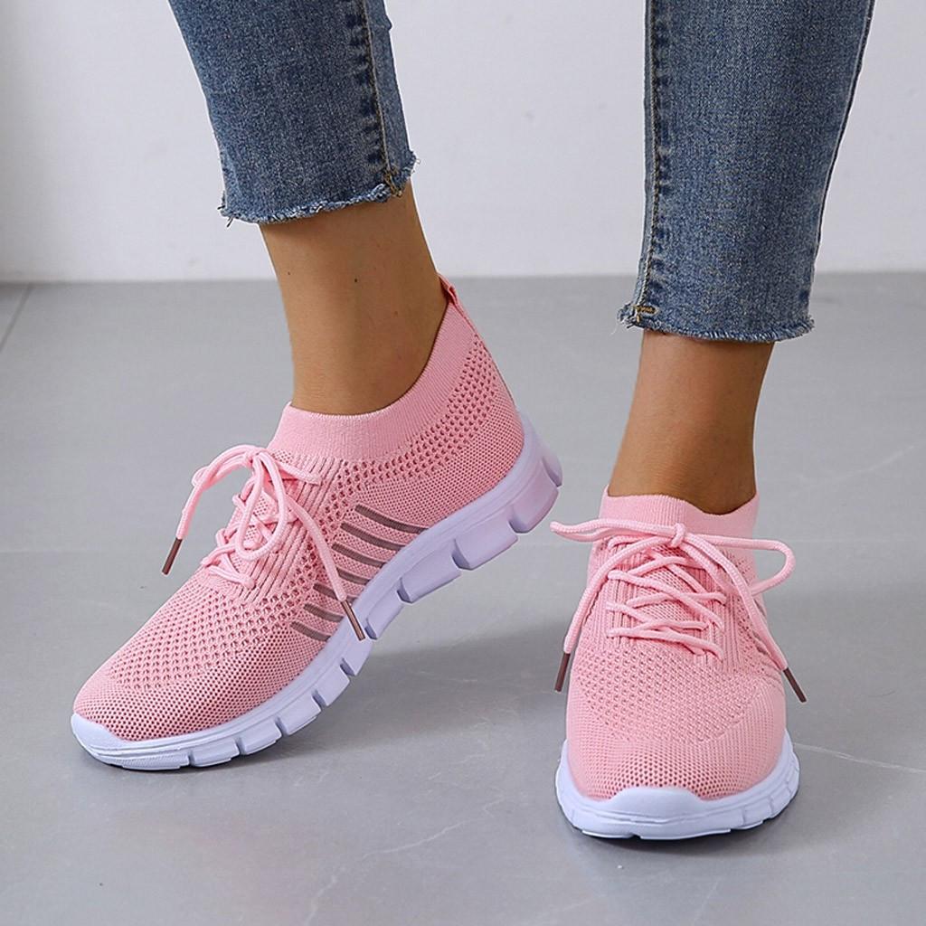 Damen Sneaker in Rosa, atmungsaktiv und bequem, ideal für Freizeit und Sport. Modische Turnschuhe mit flexibler Sohle und modernem Design.