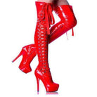 Rote Overknee-Stiefel aus Lackleder mit Schnürung und hohem Absatz. Modische Damenstiefel, ideal für auffällige Outfits und Partys.