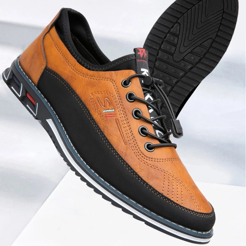 Herren-Ledersneaker in Braun und Schwarz mit rutschfester Sohle, sportlich-elegantem Design und Schnürverschluss. Perfekt für Freizeit und Büro.