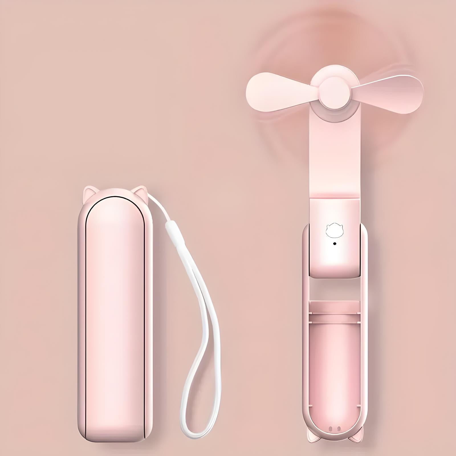 Tragbarer rosa Mini-Ventilator mit Katzenohren-Design, USB-aufladbar, kompakt und faltbar.