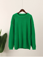 Grüner Strickpullover aus Baumwolle, lässiger Stil, ideal für Herbstmode. Bequemer, warmer Pullover für Damen und Herren.