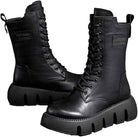 Schwarze Damen-Schnürstiefel mit dicker Sohle, modisch und robust, ideal für Herbst und Winter. Perfekt für urbanen Stil und Outdoor-Aktivitäten.