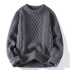 Grauer Strickpullover mit Zopfmuster, Rundhalsausschnitt und langen Ärmeln. Perfekt für Herbstmode, gemütlich und stilvoll.