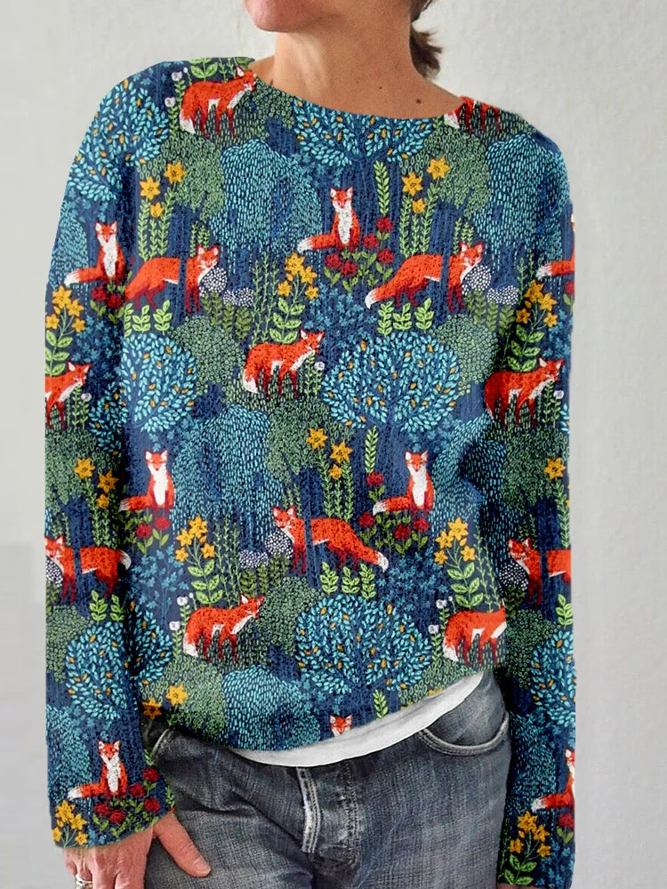 Damenpullover mit Fuchs- und Waldmotiv, bunt bedruckt, langärmelig, ideal für Herbstmode. Bequem und stilvoll für Freizeitkleidung.