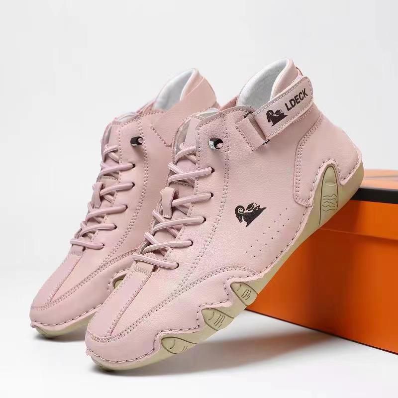 Rosa High-Top-Sneaker mit Klettverschluss, modisches Design, bequeme Passform, ideal für Freizeit und Sport. Trendige Schuhe für Damen.