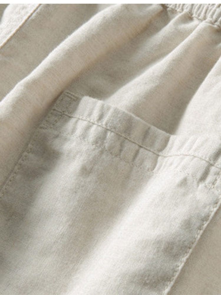 Beige Leinenhose mit elastischem Bund und Tasche, ideal für Sommermode. Atmungsaktiver Stoff, lässiger Stil, perfekt für Freizeitkleidung.