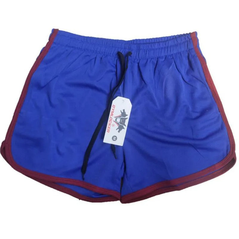 Blaue Sportshorts mit rotem Rand, elastischem Bund und Kordelzug, ideal für Fitness und Training.