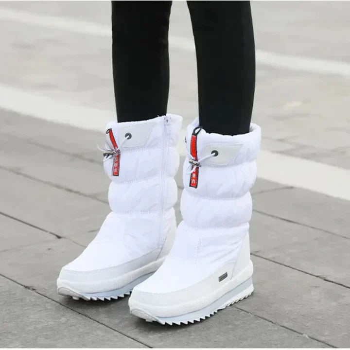 Weiße Winterstiefel für Damen, wasserdicht, warm gefüttert, rutschfeste Sohle, ideal für kalte Wetterbedingungen und Outdoor-Aktivitäten.