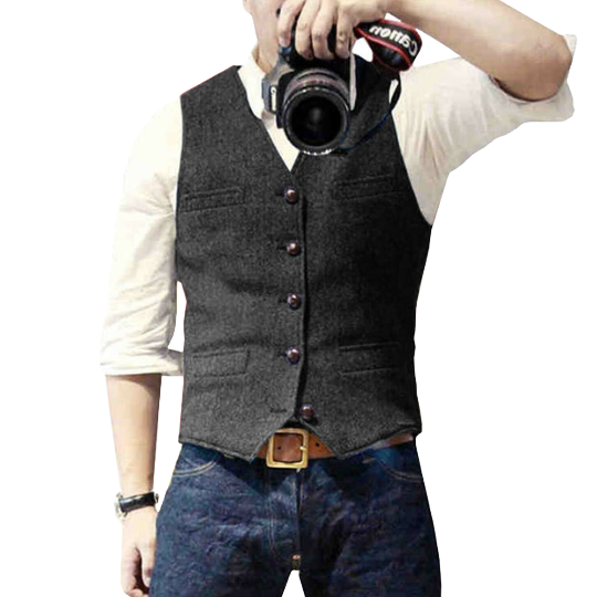 Herren-Weste aus grauem Tweed, klassisch und elegant, ideal für formelle Anlässe. Perfekt kombinierbar mit Hemd und Jeans für einen stilvollen Look.