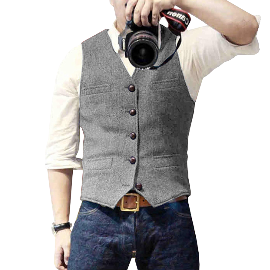 Graue Herrenweste aus Tweed, klassisch und stilvoll, ideal für formelle Anlässe. Perfekt kombiniert mit Jeans und Hemd für einen eleganten Look.