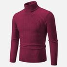 Bordeauxfarbener Rollkragenpullover aus Strick, ideal für Herbstmode. Weiches Material, elegantes Design, perfekt für stilvolle Outfits.