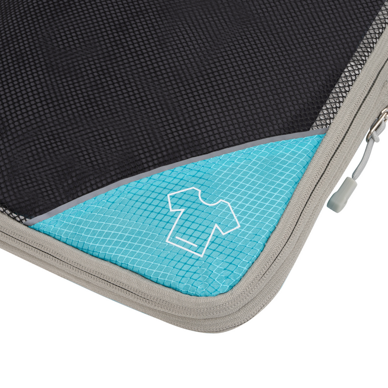 Schwarzer und blauer Packwürfel mit Reißverschluss, ideal für Reiseorganisation.