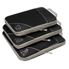 Drei schwarze Packwürfel mit Reißverschluss und Griff, ideal für Reisen und Gepäckorganisation.