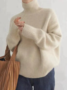 Damen Kaschmir Rollkragenpullover, beige, Herbst/Winter 2023, 100% Wolle, locker gestrickt, modisch, warm, ideal für kalte Tage.