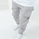 Graue Cargo-Hose für Herren mit Reißverschlusstaschen, lässiger Stil, Baumwolle.