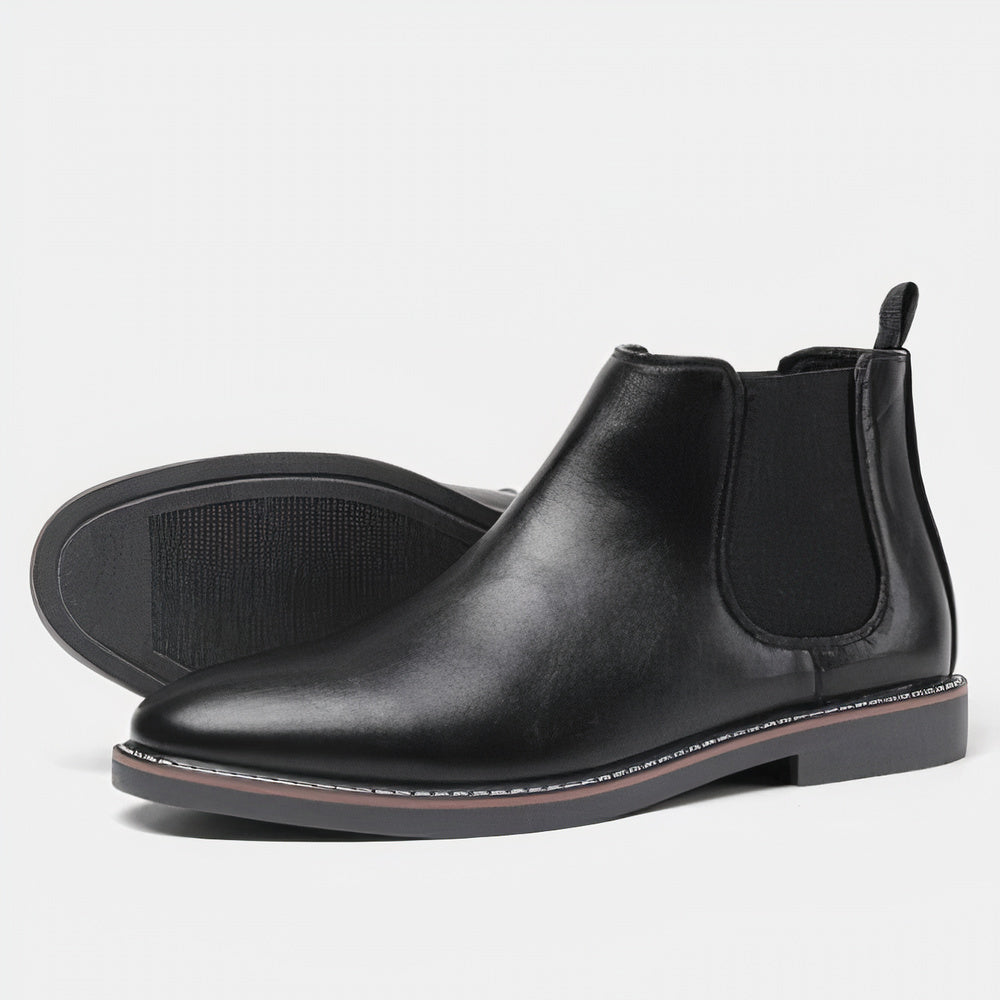 Elegante schwarze Chelsea Boots aus Leder für Herren, rutschfeste Sohle, zeitloses Design, ideal für Business und Freizeit. Hochwertige Verarbeitung.