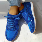 Dunkelblaue Glitzersneaker für Damen, modisch und bequem, ideal für Freizeit und Sport. Perfekt kombinierbar mit Jeans und lässiger Kleidung.