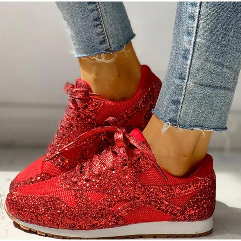 Rote Glitzersneaker für Damen, modisch und bequem, ideal für Freizeit und Sport. Funkelnde Schuhe, die jedes Outfit aufwerten.