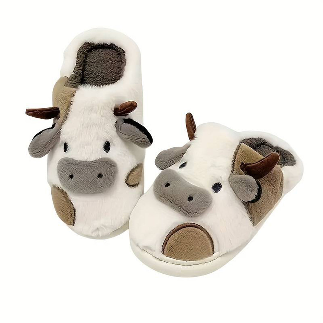 Kuschelige Kuh-Pantoffeln für Damen und Herren, aus weichem Plüsch, ideal für gemütliche Winterabende. Perfekte Geschenkidee für Tierliebhaber.