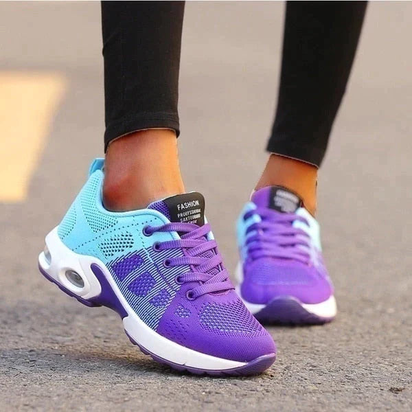 Damen-Sneaker in Lila und Blau, atmungsaktiv, ideal für Sport und Freizeit. Modische Turnschuhe mit bequemer Passform und rutschfester Sohle.