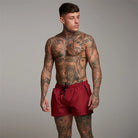 Rote Herren-Badeshorts mit Reißverschlusstaschen, Mesh-Futter, schnell trocknend. Perfekt für Sommer, Strand und Sport.