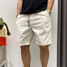 Weiße Cord-Shorts für Herren, High Street Vintage-Stil, mit Kordelzug, lässig und modisch.