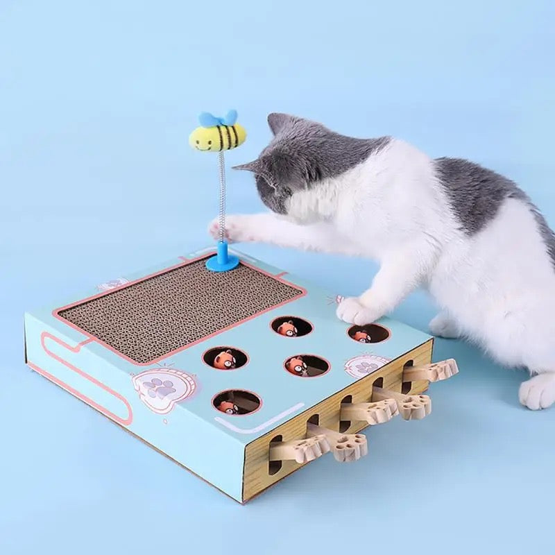 Katzenspielzeug mit Kratzbrett, Löchern und Bienenstab, interaktiv, blau, für Katzenunterhaltung.