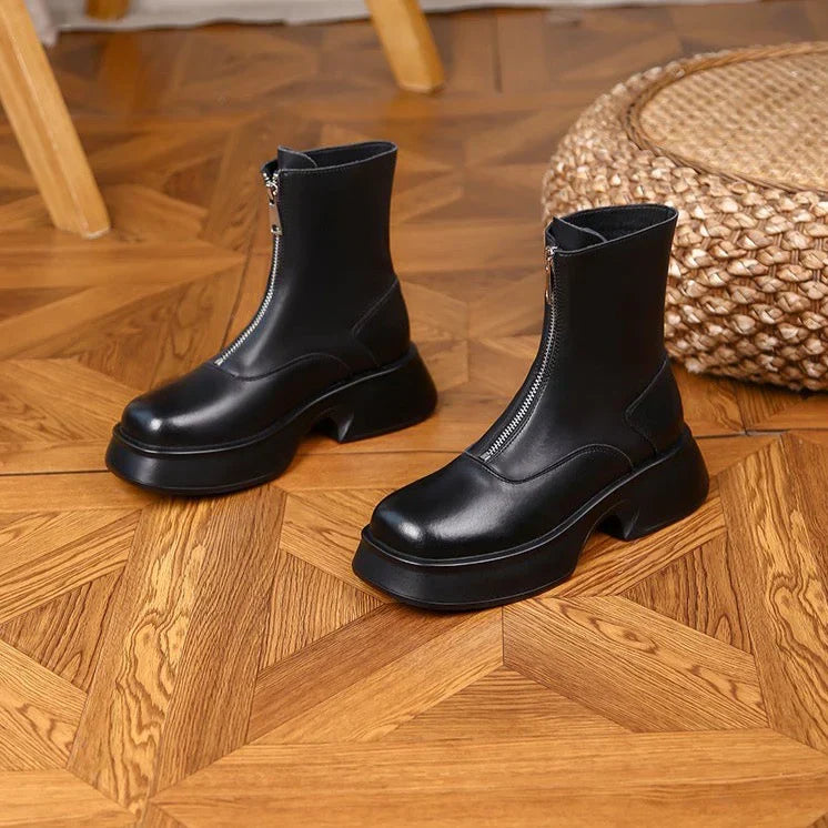 Schwarze Lederstiefel mit Reißverschluss, klobiger Absatz, modisch, Damenstiefel, Herbstmode, stilvolle Schuhe, elegantes Design, hochwertig.