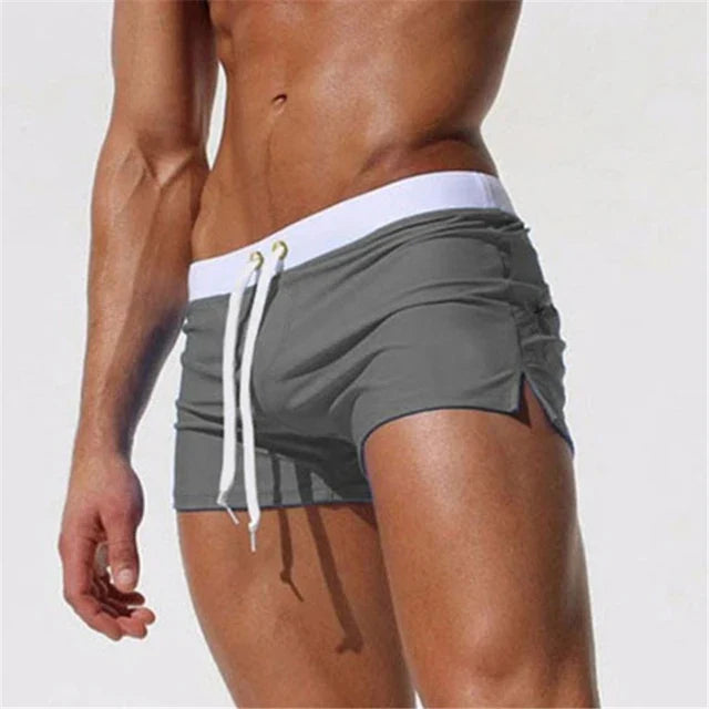 Herren-Badeshorts, schnell trocknend, atmungsaktiv, mit Reißverschlusstasche. Ideal für Surfen, Schwimmen und Strand. Komfort und Stil vereint.