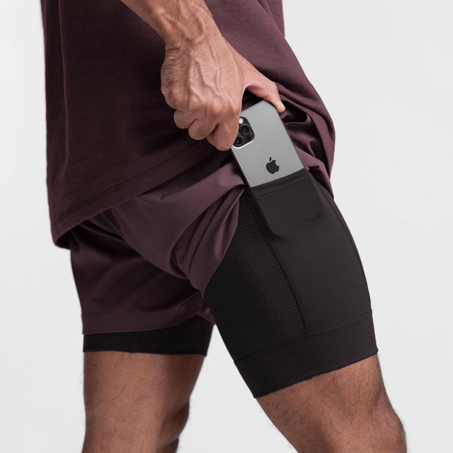 Männer 2-in-1 Streetwear Fitness Shorts, schwarz, atmungsaktiv, schnell trocknend, mit Tasche.