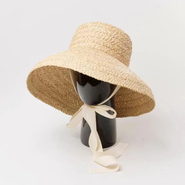 Breiter Rand Raffia Strohhut für Damen, ideal für Sommer, Strand und Urlaub. UV-Schutz, modisch und funktional. Perfekt für sonnige Tage.