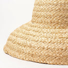 Breitrandiger Raffia-Strohhut für Damen, ideal für Sommer und Strand. UV-Schutz, modisch und funktional. Perfekt für Urlaub und Freizeit.