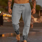 Graue Herren-Jogginghose, lässig, bequem, ideal für Strand und Freizeit. Perfekt für Sommermode, atmungsaktiv und stilvoll.