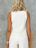 Damen-Top aus Baumwolle in Weiß, ärmellos, lässiger Stil, ideal für Sommermode. Perfekt kombinierbar mit Hosen oder Röcken.