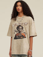 Damen T-Shirt mit Grafikdruck "Transcend", lässiger Oversize-Schnitt, beige, ideal für Streetwear-Looks, aus Baumwolle, modisch und bequem.