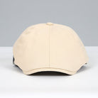 Beige Schiebermütze aus Baumwolle, klassisches Design, ideal für Herrenmode. Perfekt für stilvolle Outfits und zeitlosen Look.