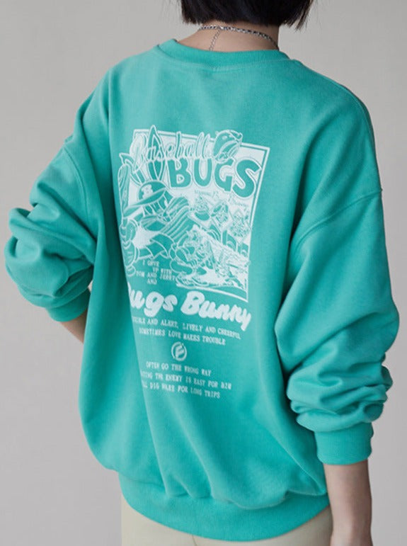 Grüner Oversize-Pullover mit Bugs Bunny-Print, lässiger Stil, ideal für Streetwear, Baumwollmaterial, modisches Design, Unisex-Kleidung.