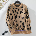 Leopardenmuster Pullover aus weichem Strick, beige mit schwarzen Flecken, modisch und warm, ideal für Herbst und Winter. Trendige Damenmode.