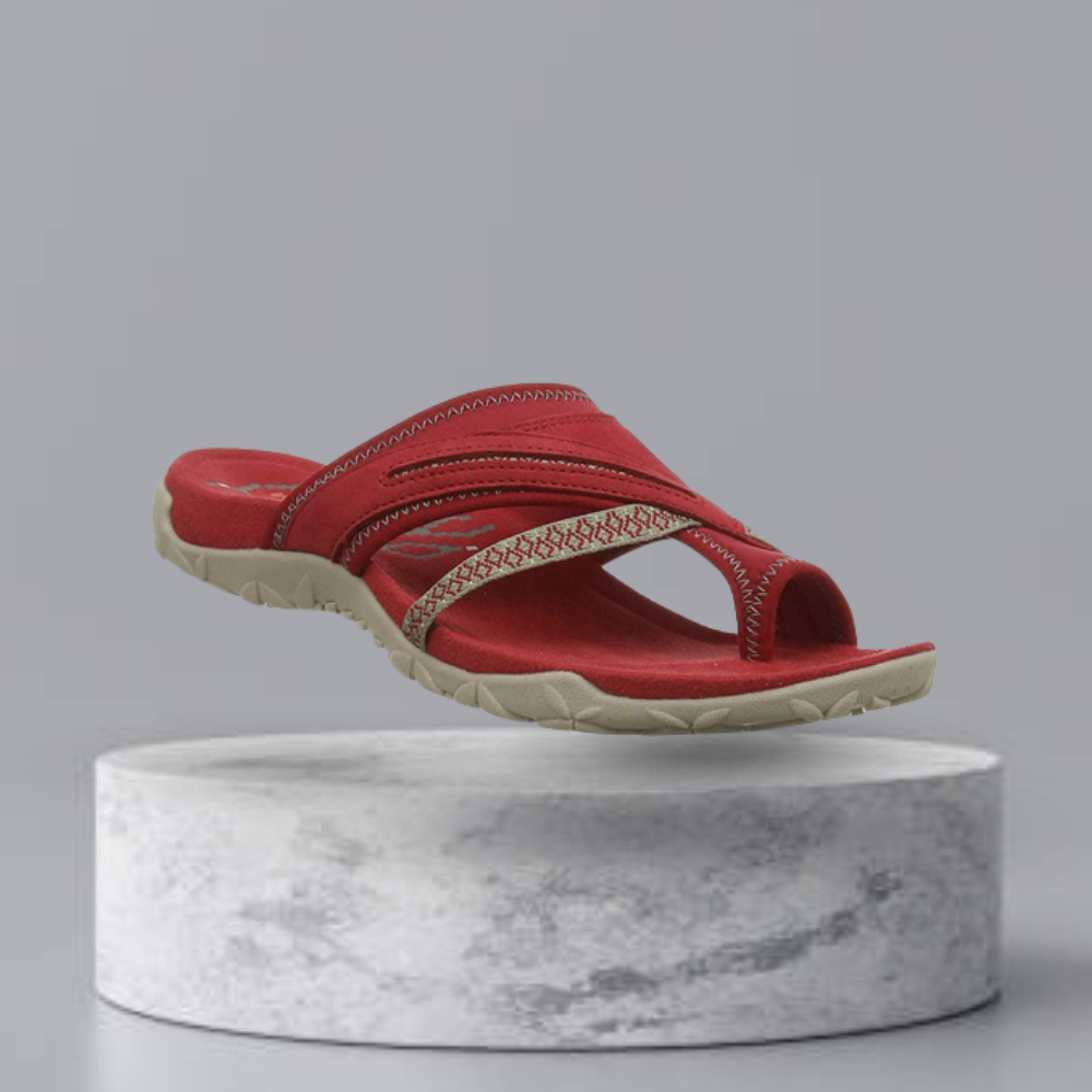 Rote Sandale mit ergonomischem Design, ideal für Sommer und Strand. Bequeme Passform, rutschfeste Sohle, modisch und langlebig.