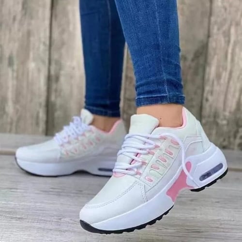 Damen-Sneaker in Weiß mit rosa Akzenten, orthopädisch, bequem, ideal für Alltag und Sport. Perfekte Passform, modisch und funktional.